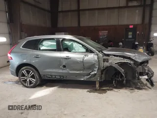 2020 Volvo XC60 Momentum with VIN YV4A22RK3L1416053, listed as a IAAI auction lot 41254175 with 52,653 mi miles and . Bid and sale history available at DreamBid. Image 14.