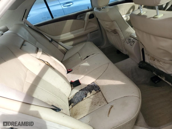 1999 Mercedes-Benz E-Class with VIN WDBJF70H7XA943409, listed as a Copart auction lot 75458484 with 0 mi miles and Salvage Title. Bid and sale history available at carsss.com. Image 10.