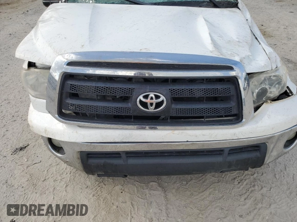 2010 Toyota Tundra z VIN 5TFRM5F10AX019942, wystawiony jako Copart lot #52418865 z przebiegiem Nie podano mil oraz Szkoda całkowita • Salvage title. Historia ofert i sprzedaży dostępna na DreamBid. Obrazek 12.