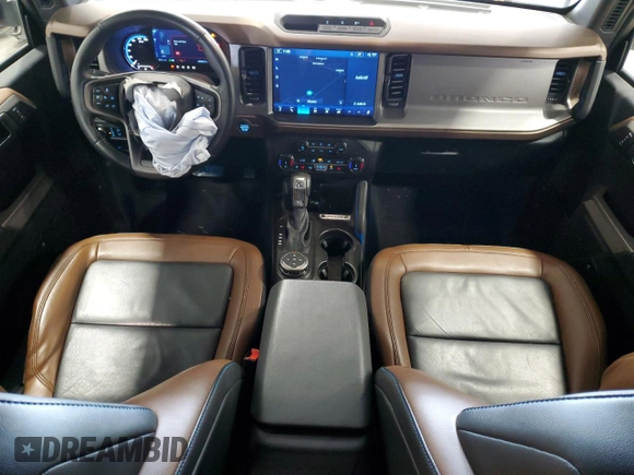 2022 Ford Bronco z VIN 1FMEE5DP8NLB90711, wystawiony jako Copart lot #63755395 z przebiegiem 22 660 mil mil oraz Szkoda całkowita • Salvage title. Historia ofert i sprzedaży dostępna na DreamBid. Obrazek 8.