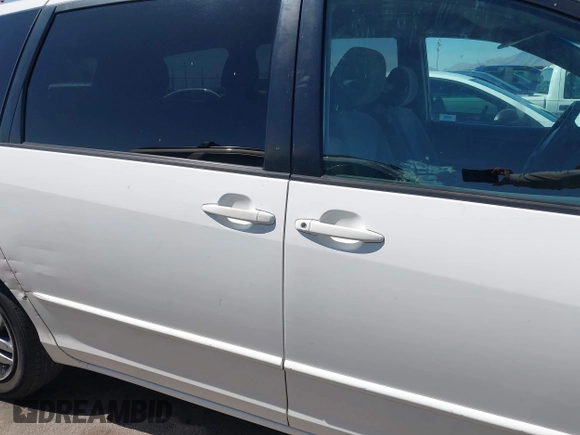 2005 Toyota Sienna CE with VIN 5TDZA23C95S364802, listed as a IAAI auction lot 42164931 with 201,737 mi miles and . Bid and sale history available at DreamBid. Image 13.