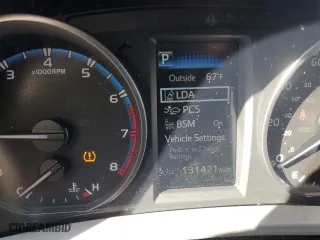 2018 Toyota RAV4 XLE with VIN 2T3WFREV2JW472232, listed as a Copart auction lot 52464025 with 131,421 mi miles and Salvage Title. Bid and sale history available at carsss.com. Image 9.