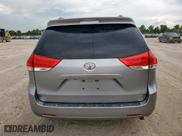 2013 Toyota Sienna XLE AAS with VIN 5TDYK3DC6DS291562, listed as a Copart auction lot 62411965 with 150,505 mi miles and Salvage title. Bid and sale history available at DreamBid. Image 6.