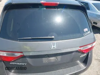 2013 Honda Odyssey EX-L with VIN 5FNRL5H65DB011071, listed as a IAAI auction lot 41992265 with 192,624 mi miles and . Bid and sale history available at DreamBid. Image 16.