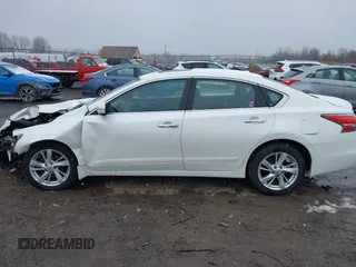 2015 Nissan Altima SV z VIN 1N4AL3AP0FC212970, wystawiony jako IAAI lot #42045260 z przebiegiem 110 433 mil mil oraz . Historia ofert i sprzedaży dostępna na DreamBid. Obrazek 14.