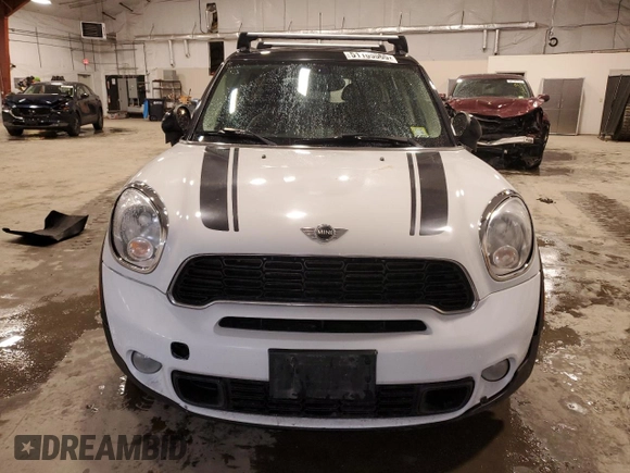 2013 MINI Countryman S ALL4 with VIN WMWZC5C56DWM15763, listed as a Copart auction lot 51165565 with 165,494 mi miles and Salvage Title. Bid and sale history available at DreamBid. Image 5.