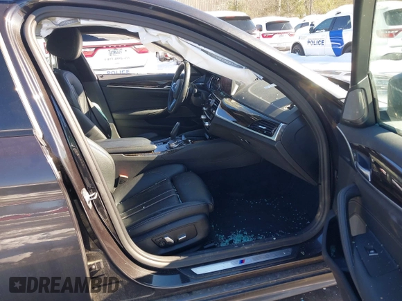 2019 BMW 5 Series 530i xDrive with VIN WBAJA7C50KWW05263, listed as a IAAI auction lot 41571583 with 71,185 mi miles and . Bid and sale history available at DreamBid. Image 5.