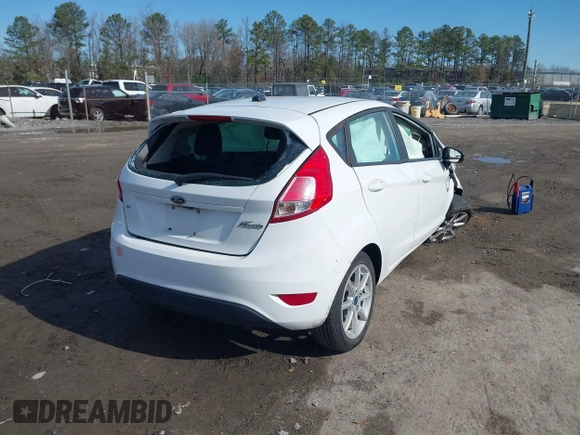 2019 Ford Fiesta SE with VIN 3FADP4EJ5KM128214, listed as a IAAI auction lot 41875482 with 114,906 mi miles. Bid and sale history available at carsss.com. Image 4.