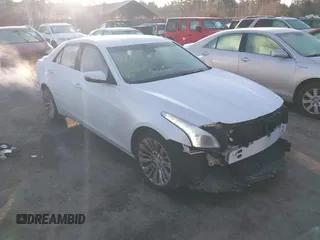 2016 Cadillac CTS Luxury Collection AWD with VIN 1G6AX5SS3G0132789, listed as a IAAI auction lot 41100109 with 107,643 mi miles and . Bid and sale history available at DreamBid. Image 1.