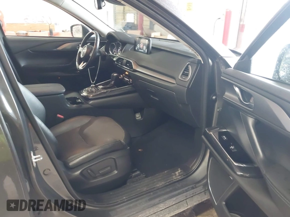 2017 Mazda CX-9 Touring with VIN JM3TCBCY1H0127229, listed as a IAAI auction lot 42320263 with 85,890 mi miles and . Bid and sale history available at DreamBid. Image 5.