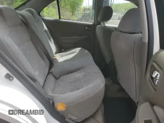 2002 Nissan Sentra GXE z VIN 3N1CB51A62L552428, wystawiony jako Copart lot #53680465 z przebiegiem 139 006 mil mil oraz Szkoda całkowita • Salvage title. Historia ofert i sprzedaży dostępna na DreamBid. Obrazek 10.