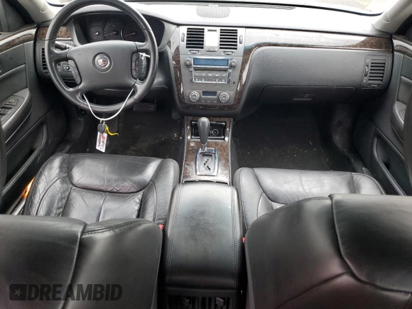 2010 Cadillac DTS 1SA z VIN 1G6KA5EY0AU125918, wystawiony jako Copart lot #45471305 z przebiegiem 56 685 mil mil oraz Szkoda całkowita • Salvage title. Historia ofert i sprzedaży dostępna na DreamBid. Obrazek 8.