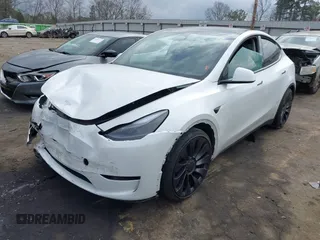 2024 Tesla Model Y Performance with VIN 7SAYGDEF4RA278532, listed as a IAAI auction lot 41511769 with 9,487 mi miles and . Bid and sale history available at DreamBid. Image 2.