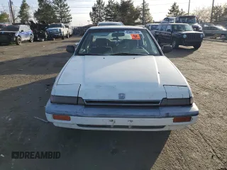 1987 Honda Accord z VIN JHMCA5633HC044303, wystawiony jako Copart lot #85697384 z przebiegiem 19 871 mil mil oraz Nie do naprawy • Non repairable. Historia ofert i sprzedaży dostępna na DreamBid. Obrazek 5.