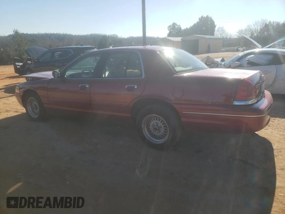 1998 Ford Crown Victoria LX с VIN 2FAFP74W3WX138757, выставлен на аукционе Copart как лот 87867945 с пробегом 148 827 миль миль и Списание • Salvage title. История ставок и продаж доступна на DreamBid. Изображение 2.