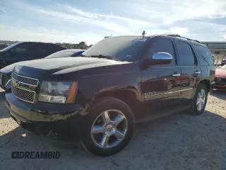 2009 Chevrolet Tahoe LTZ z VIN 1GNFC33039R193288, wystawiony jako Copart lot #42060905 z przebiegiem 122 971 mil mil oraz Szkoda całkowita • Salvage title. Historia ofert i sprzedaży dostępna na DreamBid. Obrazek 1.