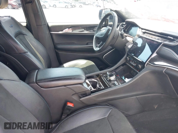 2022 Jeep Grand Cherokee Trailhawk with VIN 1C4RJYC68N8759961, listed as a IAAI auction lot 42589997 with 28,429 mi miles and . Bid and sale history available at DreamBid. Image 5.
