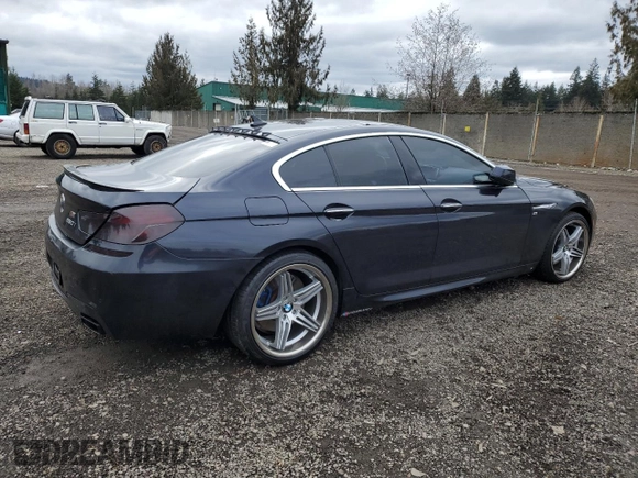 2013 BMW 6 Series 650i with VIN WBA6B2C50DD128242, listed as a Copart auction lot 44441885 with 107,960 mi miles and Salvage Title. Bid and sale history available at DreamBid. Image 3.
