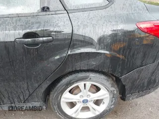 2014 Ford Focus SE с VIN 1FADP3F29EL292802, выставлен на аукционе IAAI как лот 42171259 с пробегом 106 438 миль миль и . История ставок и продаж доступна на DreamBid. Изображение 13.