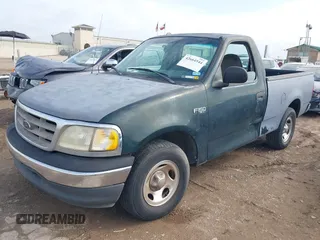 2001 Ford F-150 XL with VIN 3FTZF17271MA82150, listed as a IAAI auction lot 42664544 with 199,156 mi miles and . Bid and sale history available at DreamBid. Image 2.