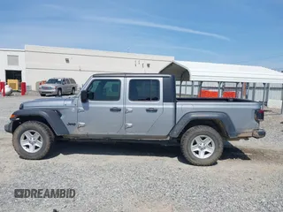 2020 Jeep Gladiator Sport S with VIN 1C6HJTAG7LL128940, listed as a IAAI auction lot 42108154 with 90,596 mi miles and . Bid and sale history available at DreamBid. Image 14.