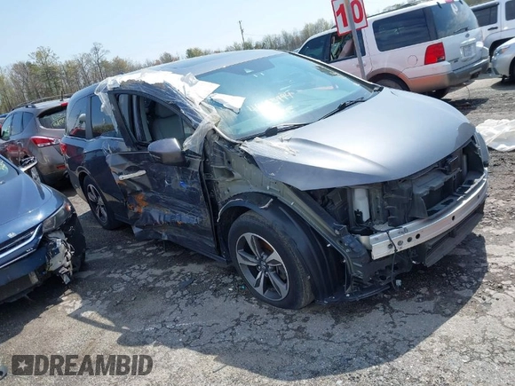 2018 Honda Odyssey Touring with VIN 5FNRL6H8XJB029570, listed as a IAAI auction lot 41485794 with 77,601 mi miles. Bid and sale history available at carsss.com. Image 1.