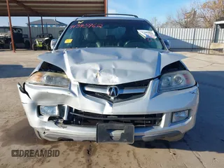 2004 Acura MDX Touring Pkg w/Navigation with VIN 2HNYD18804H546977, listed as a IAAI auction lot 41345964 with 161,856 mi miles. Bid and sale history available at carsss.com. Image 12.