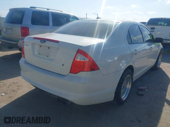 2011 Ford Fusion S with VIN 3FAHP0GA4BR268927, listed as a IAAI auction lot 41772569 with 305,339 mi miles. Bid and sale history available at carsss.com. Image 4.