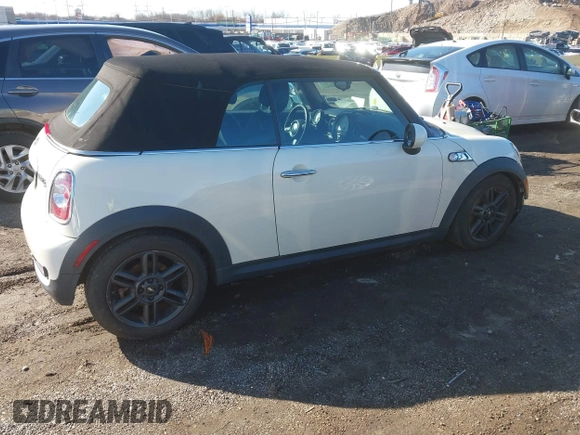 2011 MINI Convertible S with VIN WMWZP3C54BTX82748, listed as a IAAI auction lot 41817396 with 113,458 mi miles and . Bid and sale history available at DreamBid. Image 4.