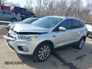 2017 Ford Escape Titanium with VIN 1FMCU0JD3HUB13234, listed as a IAAI auction lot 41760944 with 113,361 mi miles. Bid and sale history available at carsss.com. Image 14.