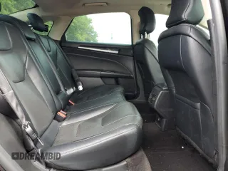 2019 Ford Fusion Titanium z VIN 3FA6P0RU4KR211674, wystawiony jako Copart lot #62205885 z przebiegiem 313 261 mil mil oraz Szkoda całkowita • Salvage title. Historia ofert i sprzedaży dostępna na DreamBid. Obrazek 10.