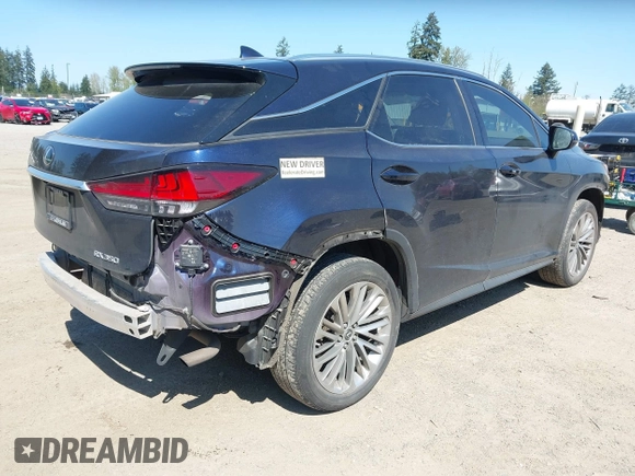 2020 Lexus RX with VIN 2T2JZMDA2LC223392, listed as a IAAI auction lot 42028542 with 55,739 mi miles. Bid and sale history available at carsss.com. Image 4.