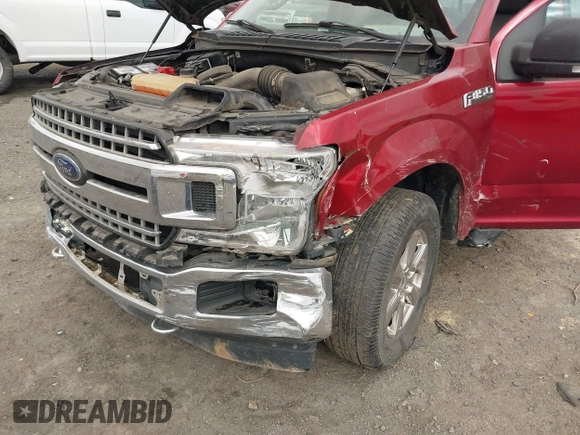 2018 Ford F-150 XL with VIN 1FTFX1E51JKF98962, listed as a IAAI auction lot 41827587 with 128,031 mi miles and . Bid and sale history available at DreamBid. Image 6.
