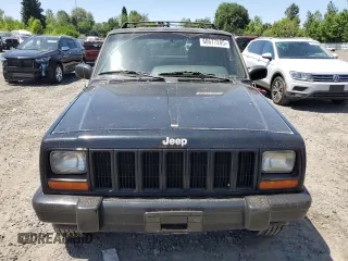 2000 Jeep Cherokee Classic with VIN 1J4FF58S4YL175741, listed as a Copart auction lot 60677205 with Not provided miles and Clean title. Bid and sale history available at DreamBid. Image 5.