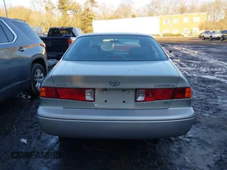 2001 Toyota Camry LE z VIN 4T1BF28K11U122669, wystawiony jako IAAI lot #41574866 z przebiegiem 233 301 mil mil oraz . Historia ofert i sprzedaży dostępna na DreamBid. Obrazek 16.