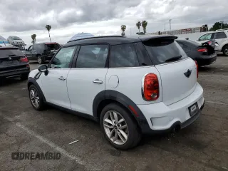 2013 MINI Countryman S with VIN WMWZC3C54DWP24877, listed as a Copart auction lot 53583655 with 97,734 mi miles and Salvage title. Bid and sale history available at DreamBid. Image 2.