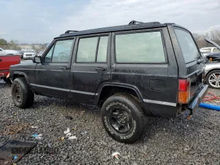 1994 Jeep Cherokee Sport with VIN 1J4FT68S0RL234669, listed as a Copart auction lot 44044555 with 282,179 mi miles and Salvage title. Bid and sale history available at DreamBid. Image 2.