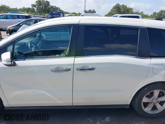 2018 Honda Odyssey EX with VIN 5FNRL6H57JB100035, listed as a IAAI auction lot 42582758 with 88,585 mi miles and . Bid and sale history available at DreamBid. Image 15.
