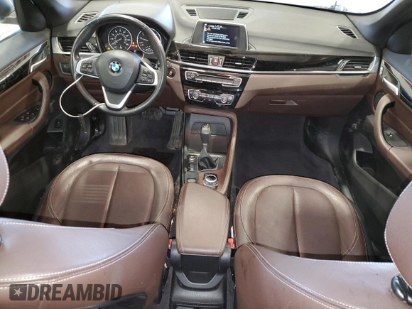 2017 BMW X1 xDrive28i with VIN WBXHT3C36H5F76388, listed as a Copart auction lot 48435305 with 51,841 mi miles and Salvage title. Bid and sale history available at DreamBid. Image 8.