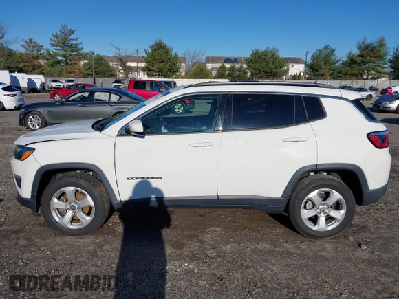 2020 Jeep Compass Latitude with VIN 3C4NJDBB2LT115599, listed as a IAAI auction lot 40970548 with 63,349 mi miles. Bid and sale history available at carsss.com. Image 14.