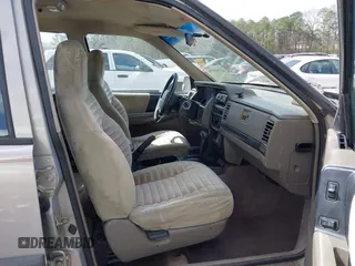 1994 Jeep Grand Cherokee Laredo with VIN 1J4GZ58Y0RC200247, listed as a IAAI auction lot 41781078 with 217,698 mi miles. Bid and sale history available at carsss.com. Image 5.