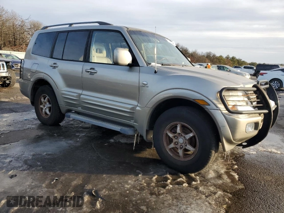 2002 Mitsubishi Montero Limited z VIN JA4MW51R12J020808, wystawiony jako Copart lot #41915255 z przebiegiem 127 834 mil mil oraz Czysty tytuł • Clean title. Historia ofert i sprzedaży dostępna na DreamBid. Obrazek 4.