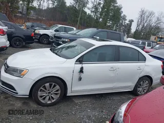 2015 Volkswagen Jetta Sedan 1.8T SE with VIN 3VWD17AJ6FM237674, listed as a IAAI auction lot 41613054 with 71,325 mi miles. Bid and sale history available at carsss.com. Image 14.