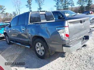 2017 Nissan Titan SV with VIN 1N6AA1EK5HN516884, listed as a IAAI auction lot 41225719 with 109,749 mi miles and . Bid and sale history available at DreamBid. Image 3.