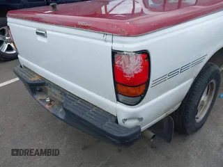 1995 Mazda B-Series Truck z VIN 4F4CR12A9STM30259, wystawiony jako IAAI lot #42243443 z przebiegiem 211 203 mil mil oraz . Historia ofert i sprzedaży dostępna na DreamBid. Obrazek 12.