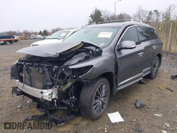 2016 Infiniti QX60 with VIN 5N1AL0MM1GC502111, listed as a IAAI auction lot 41866740 with 97,360 mi miles and . Bid and sale history available at DreamBid. Image 2.