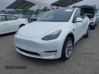 2024 Tesla Model Y Long Range with VIN 7SAYGDEEXRF059620, listed as a IAAI auction lot 42190425 with 16,682 mi miles. Bid and sale history available at carsss.com. Image 19.
