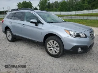 2015 Subaru Outback Premium with VIN 4S4BSAFC4F3303943, listed as a Copart auction lot 62279865 with 128,194 mi miles and Salvage title. Bid and sale history available at DreamBid. Image 4.
