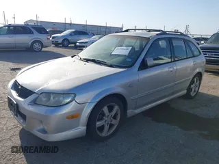 2003 Mazda Protege with VIN JM1BJ245131122498, listed as a IAAI auction lot 41990488 with 170,880 mi miles and . Bid and sale history available at DreamBid. Image 2.