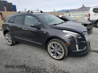 2020 Cadillac XT5 AWD Sport with VIN 1GYKNHRS7LZ122393, listed as a Copart auction lot 84266534 with 19,641 mi miles and Salvage title. Bid and sale history available at DreamBid. Image 4.